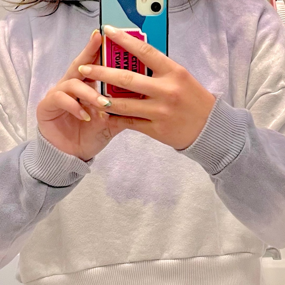 Cute hoodie with a pastel purple fade to white tiedye.